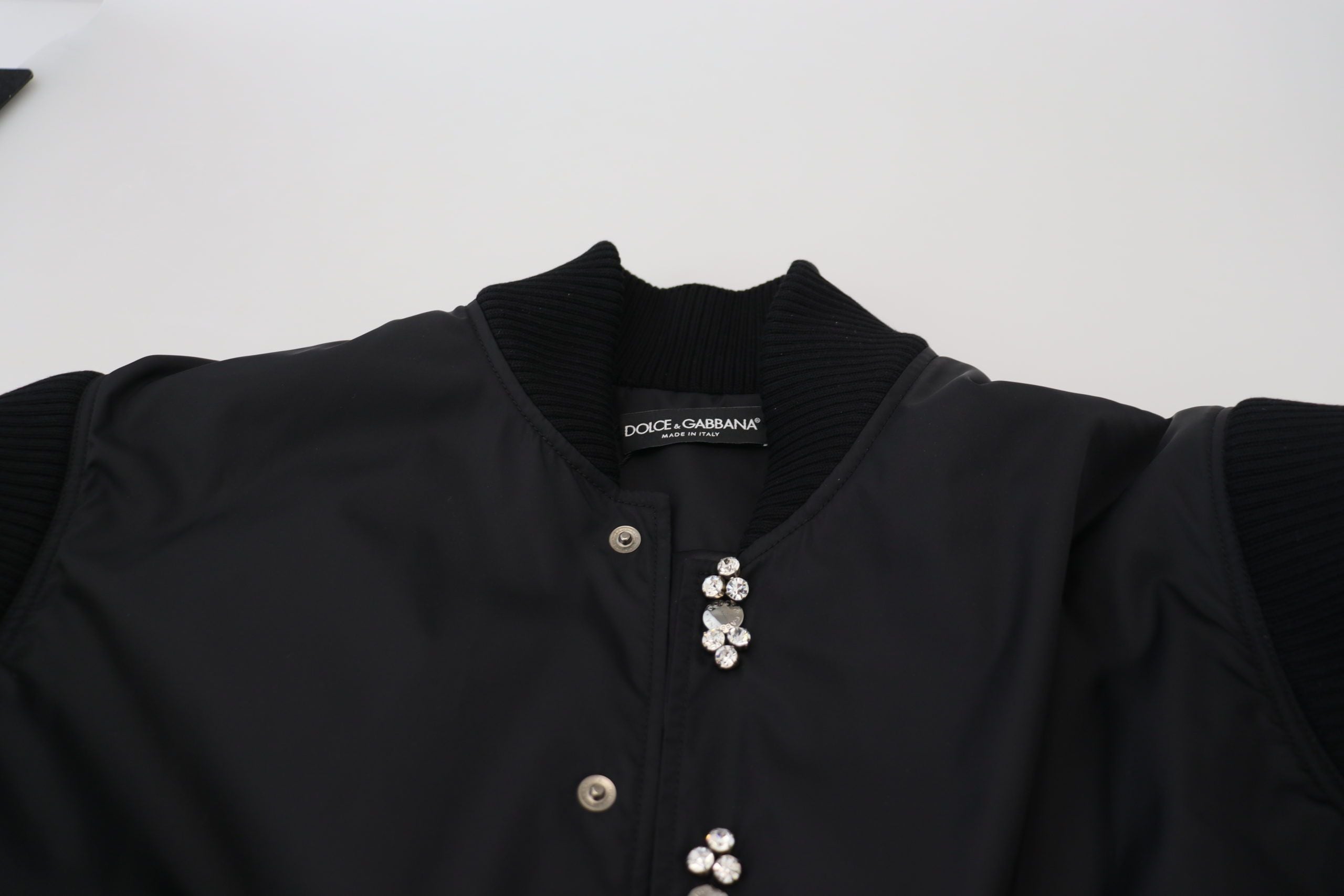 Dolce & Gabbana Elegante chaqueta bomber negra con adornos de cristales
